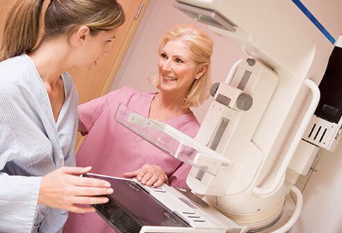 A young woman gets a mammogram.
