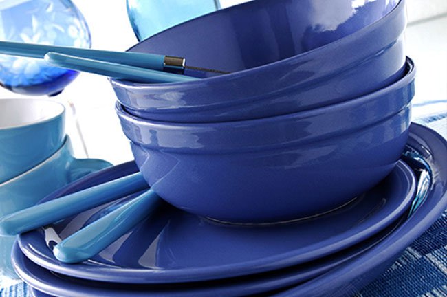 Believe it or not, using blue plates and dishes might reduce how much food you serve yourself.