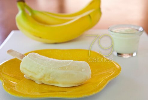 Make frozen banana pops by inserting popsicle sticks into halved, peeled bananas and coating with half an ounce of low-fat plain yogurt.