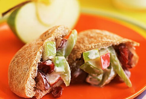 Photo of a grape and apple sandwich in a wholegrain pita.