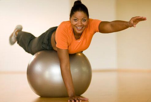 Photo of woman on exercise ball.