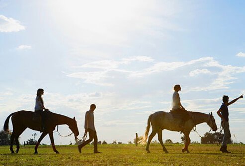 People riding horses