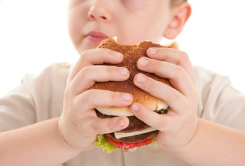 Eating undercooked meat may lead to nausea, diarrhoea, and bloating from food poisoning.