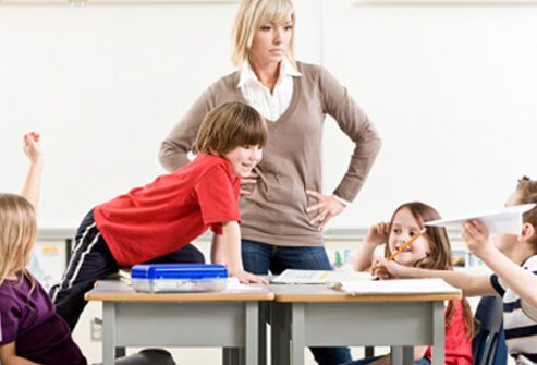 A teacher is not happy about her student's inattention.