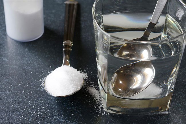 Rinsing your mouth out with salt water is one way to relieve canker sore discomfort.