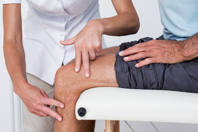 The first step is to get the kneecap back in the groove at the bottom of your thighbone.