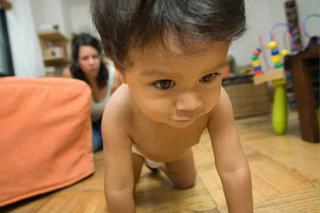 Crawl around the house to see hazards your baby might face so you can take steps to safeguard your home.