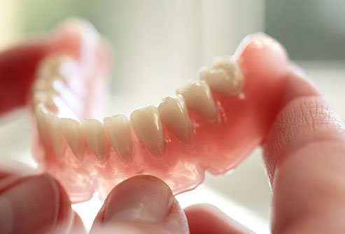 Dentures can leave spaces for nasty bacteria to grow.