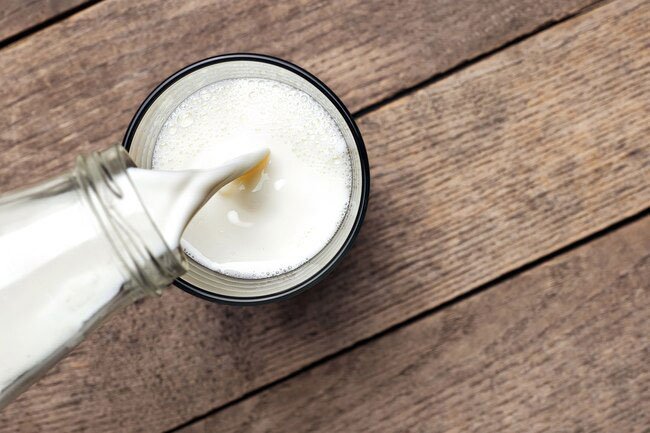 Studies show a glass of whole milk every so often doesn't increase weight gain and may even help you lose.