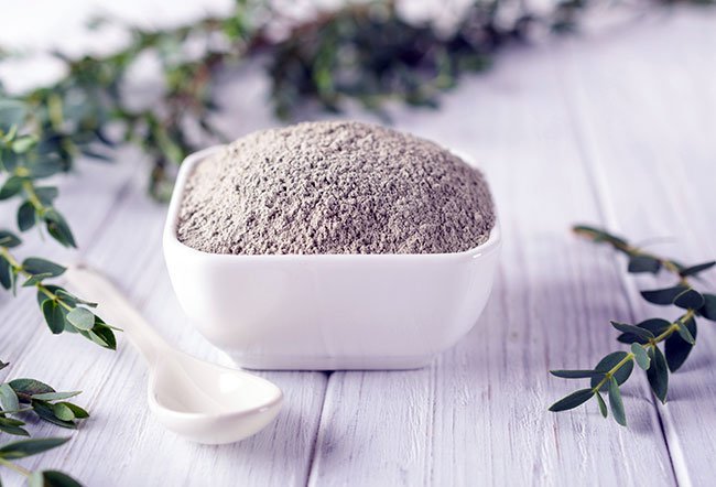 Bentonite clay is an ancient home remedy that is used for a variety of issues. Bentonite clay is used to treat acne, wounds, ulcers, skin allergies, bloating and diarrhea.