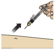 After all the liquid medicine is injected, remove
the needle from the skin - Illustration