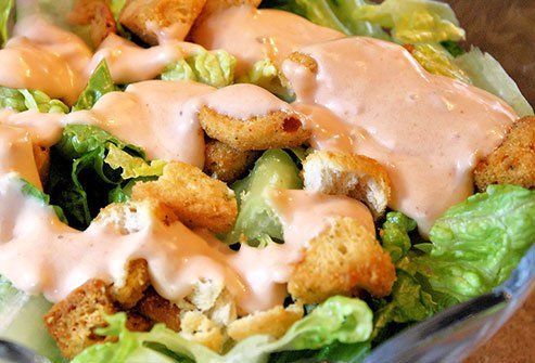 Dressings like ranch, blue cheese, and Thousand Island are often high in calories.