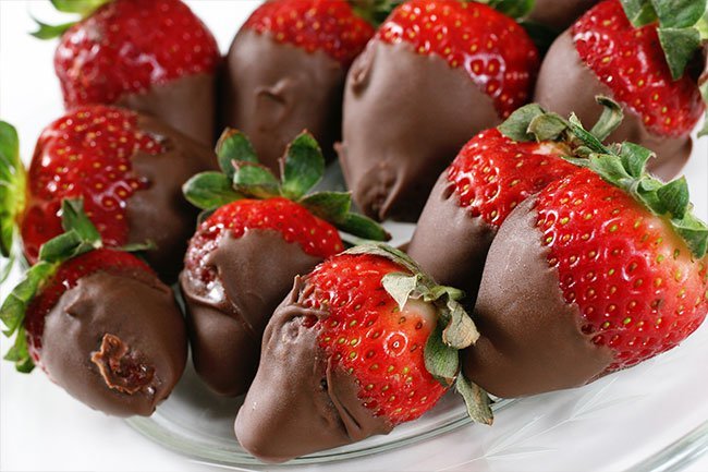 Whether they're dipped in chocolate or topped with whipped cream, strawberries are a romantic favorite.