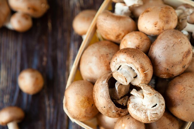 Store mushrooms unwashed in a brown paper bag in the fridge.