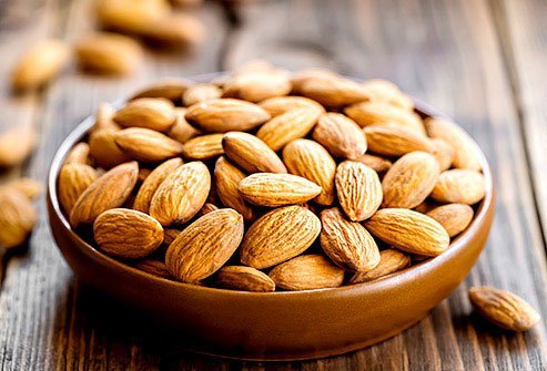 Eat antioxidant-rich foods to clear acne like nuts.