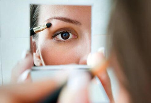 Photo of woman in mirror.