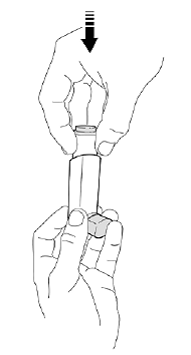 When the actuator is dry, gently press the
canister down in the actuator - Illustration