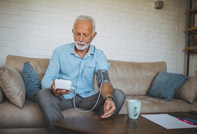 what is the proper way to take your blood pressure?