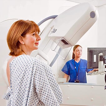 Screening mammograms can detect breast cancer in women who have no symptoms or signs.