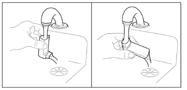 Hold the actuator under the tap and run
warm water through it for about 30 seconds - Illustration