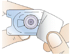 Press down firmly on the adapter until it snaps into
place, with the adapter spike pushing through the vial stopper - Illustration