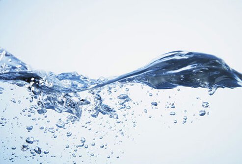 Wave of water in a glass.