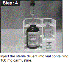 Inject the sterile diluent into vial containing 100 mg
carmustine - Illustration