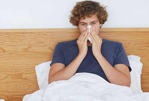 A runny or stuffy nose is typically a symptom of a cold.