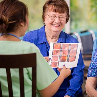 A doctor going over colonoscopy results with a patient.