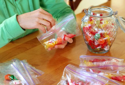 Put a few glucose tablets, or five or six pieces of hard candy, into baggies.
