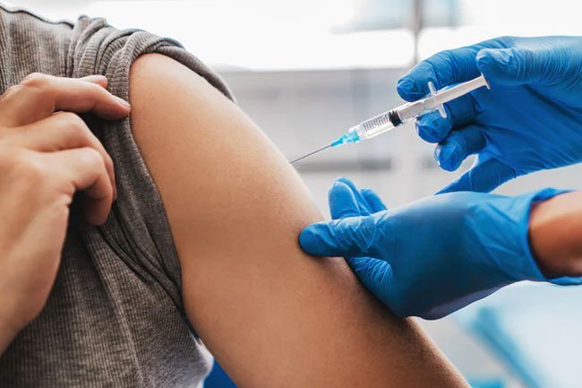 Social distancing means you're farther from other people's germs, but you still need a flu shot, along with other routine vaccines like shingles or measles.