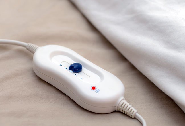 Heated blankets are regular blankets that contain wires within that heat them up. They may pose a risk for fires and burns. They may also be more dangerous for infants, elderly people, diabetics, pregnant women and those who have nerve disorders. 