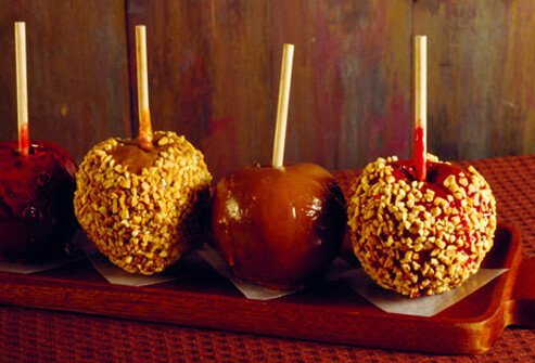 An afternoon snack of apples with a thick layer of caramel and nuts can total more than 500 calories.
