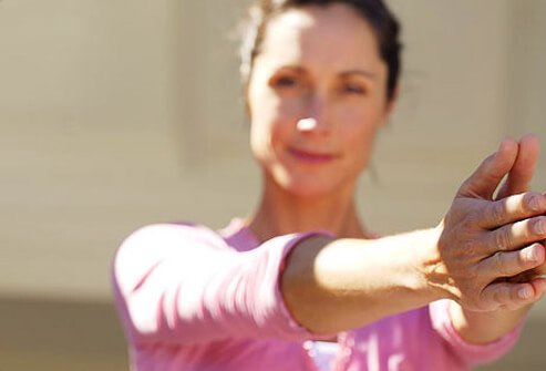 Woman doing some simple exercise routines to boost her energy.
