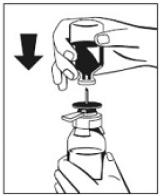 With the FIBRYGA bottle held firmly on a level
surface, invert the sWFI bottle and place it at the center of the water spike - Illustration