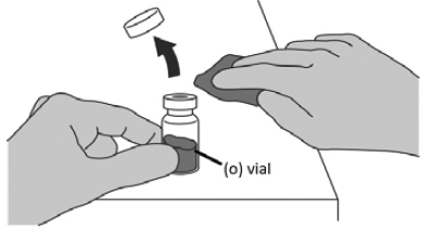 Pull the vial adaptor cover off the vial. - Illustration