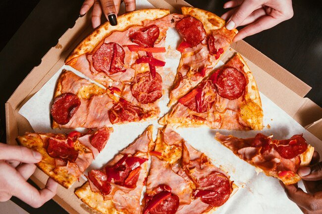 Take out pizza is typically high in fat, sodium, and excess calories, which increase the risk of a heart attack.