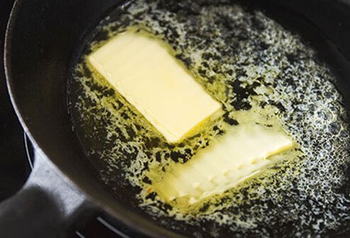 A diet high in saturated fats like those found in butter increases the risk of heart disease and high cholesterol. 