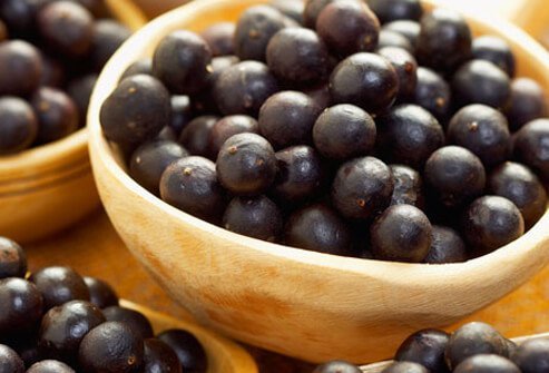 Acai berries stem from a palm tree in the rainforest of Brazil.