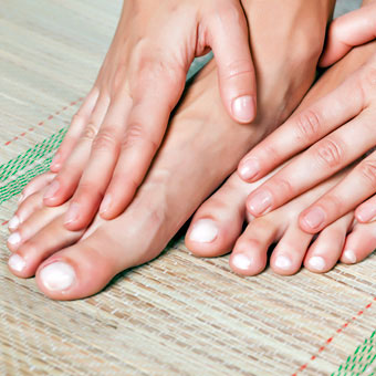 Photo of a woman's healthy toenails.