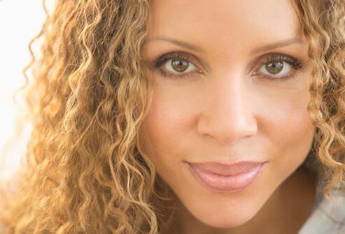 Photo of woman with curls.