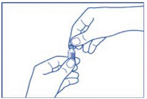 Using your thumb, flip the orange plastic
cap off the GlucaGen vial - Illustration