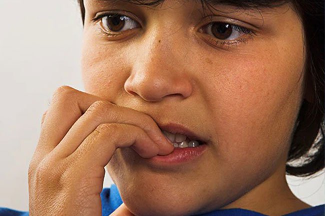 Kids chewing on their fingernails, keys, pencils, hair, or dog toys is a normal habit.