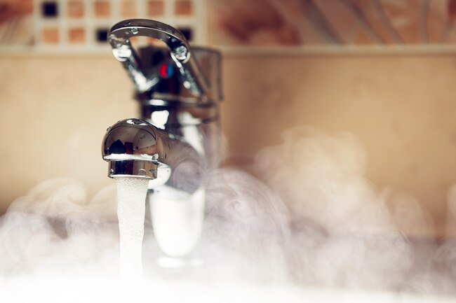 Mix your own cleaners with hot water and label them right away.