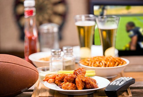 Game day food and football on TV.