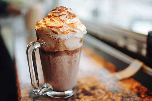 Use whole milk, fat-free milk or unsweetened almond or soy milk instead of sweetened condensed milk or heavy whipping cream to keep fat and calorie intake lower. 