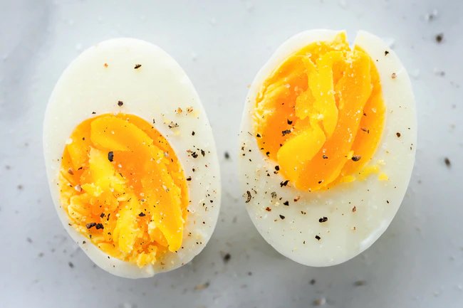 Hard-boiled eggs provide protein, vitamin D, and cholesterol.