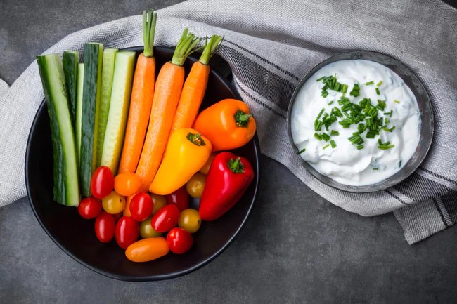 Make a healthy dip for your veggies with plain Greek yogurt, lemon juice, dried dill and minced garlic.
