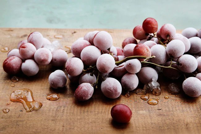 On hot days when a popsicle would hit the spot, try snacking on frozen seedless grapes instead.
