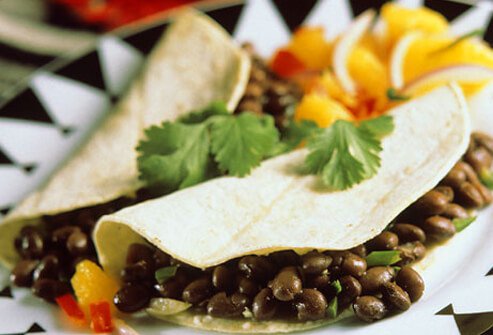 At Mexican eateries, dining out is a party. But beware the lard and cheese.